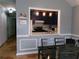 Open dining area with a view into the kitchen featuring stainless appliances at 6051 Wintergreen Rd, Norcross, GA 30093