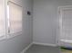 Cozy room featuring a sunny window and door with view to the yard at 6051 Wintergreen Rd, Norcross, GA 30093