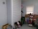 Well organized storage room with shelving, boxes, shoes, and decor at 6051 Wintergreen Rd, Norcross, GA 30093