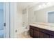 Bathroom featuring a double sink vanity, toilet and a tub and shower at 811 Lake Chase, Fairburn, GA 30213