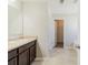 Bathroom featuring a double sink vanity, toilet, and tub at 811 Lake Chase, Fairburn, GA 30213