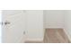 Bright walk-in closet with carpeting, paint and natural light at 811 Lake Chase, Fairburn, GA 30213