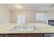 Close-up of a kitchen sink with granite countertops, perfect for cooking and entertaining at 811 Lake Chase, Fairburn, GA 30213