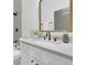 Bathroom featuring a sink with stylish faucet, shower and decorative tiles at 826 Gaston Street Sw, Atlanta, GA 30310