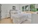 Well-lit bedroom with a large window, a comfortable bed, and tasteful decor at 826 Gaston Street Sw, Atlanta, GA 30310