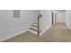 Hallway featuring wood floor and stairs at 826 Gaston Street Sw, Atlanta, GA 30310