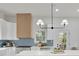 Modern kitchen featuring white cabinetry, blue tile backsplash, and stainless steel appliances and range at 826 Gaston Street Sw, Atlanta, GA 30310