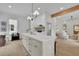 Spacious kitchen with a large island and plenty of storage, seamlessly connected to other living areas at 826 Gaston Street Sw, Atlanta, GA 30310