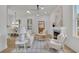 Open-concept living room with a fireplace, comfortable seating, and a view to the dining area at 826 Gaston Street Sw, Atlanta, GA 30310