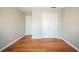 Bedroom with hardwood floors and dual closets at 104 Shadow Creek Ct, Fairburn, GA 30213