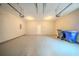 Two car garage with electric door openers, bright lighting and space for storage at 104 Shadow Creek Ct, Fairburn, GA 30213
