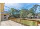 A backyard deck leads to a spacious yard at 110 Eastfield Ct, Mcdonough, GA 30252