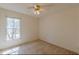 A cozy bedroom with natural light and plush neutral carpet at 110 Eastfield Ct, Mcdonough, GA 30252