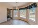 Cozy dining room filled with natural light, complemented by lovely views, ideal for Gathering meals at 110 Eastfield Ct, Mcdonough, GA 30252