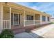 Charming covered front porch with decorative railing and detailed door, adding curb appeal at 110 Eastfield Ct, Mcdonough, GA 30252