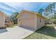 Detached two-car garage with extra storage space and a concrete driveway in a desirable location at 110 Eastfield Ct, Mcdonough, GA 30252