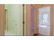 Hallway with multiple entryways that lead to other rooms at 110 Eastfield Ct, Mcdonough, GA 30252