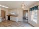 Classic kitchen design with ample cabinet space and wood-look floors creating a warm and welcoming atmosphere at 110 Eastfield Ct, Mcdonough, GA 30252