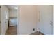 Convenient laundry room off entryway, complete with washer, dryer, and storage cabinets at 110 Eastfield Ct, Mcdonough, GA 30252