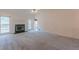 Bright living room showcasing a marble fireplace and large windows that offer beautiful views at 110 Eastfield Ct, Mcdonough, GA 30252