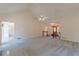 Spacious living room with high ceilings flows into entry, perfect for entertaining and relaxation at 110 Eastfield Ct, Mcdonough, GA 30252