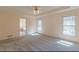 Large main bedroom with neutral carpet, a ceiling fan, and an ensuite bathroom at 110 Eastfield Ct, Mcdonough, GA 30252