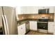 A beautifully updated kitchen with stainless steel appliances and granite countertops at 5582 Windwood Rd, Atlanta, GA 30349