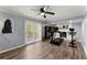 Finished basement with gym equipment, fireplace, and sliding glass door to the exterior at 5916 Simone Dr, Stone Mountain, GA 30087