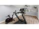 Finished basement featuring workout equipment and access to the upper level at 5916 Simone Dr, Stone Mountain, GA 30087