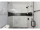New shower featuring glass door and black hardware at 5916 Simone Dr, Stone Mountain, GA 30087