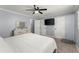 Spacious bedroom with closet and TV at 5916 Simone Dr, Stone Mountain, GA 30087