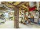 Spacious unfinished basement with storage and brick columns, providing versatile space at 1000 Nw Main St, Conyers, GA 30012