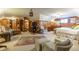 Large bedroom featuring vintage furniture, wood walls, and plenty of space at 1000 Nw Main St, Conyers, GA 30012