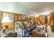 Cozy bedroom with daybed, wood paneled walls, and vintage decor at 1000 Nw Main St, Conyers, GA 30012