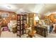 Bedroom with wooden walls, vintage furniture, and plenty of character at 1000 Nw Main St, Conyers, GA 30012