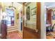 Welcoming entryway with hardwood floors and view of the living area at 1000 Nw Main St, Conyers, GA 30012