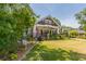 Charming two-story home featuring a well-manicured lawn, colorful flower beds and a welcoming front porch at 1000 Nw Main St, Conyers, GA 30012