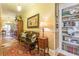 Inviting hallway with bench, built-in bookcase, and view into other rooms at 1000 Nw Main St, Conyers, GA 30012