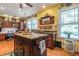 Bright eat-in kitchen showcases wooden cabinets, a butcher block island and stainless steel appliances at 1000 Nw Main St, Conyers, GA 30012