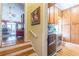 Convenient laundry area with washer, dryer, and wooden cabinets at 1000 Nw Main St, Conyers, GA 30012