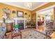 Elegant living room featuring fireplace, chandelier, and hardwood floors at 1000 Nw Main St, Conyers, GA 30012