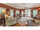 Well-lit living room boasting hardwood floors, many large windows and comfortable seating areas at 1000 Nw Main St, Conyers, GA 30012