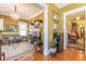 Elegant living room featuring chandelier, fireplace, and hardwood floors at 1000 Nw Main St, Conyers, GA 30012