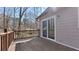 Spacious wooden back deck with sliding door access to the house's interior at 108 Kelly Ct, Dallas, GA 30157