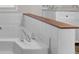 Close-up of the tub, which features decorative wood paneling at 108 Kelly Ct, Dallas, GA 30157