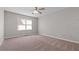 Comfortable bedroom with ceiling fan, neutral carpet and good natural light at 108 Kelly Ct, Dallas, GA 30157