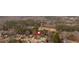 Aerial view shows the home's location within a peaceful wooded neighborhood at 127 Hyde Way, Dallas, GA 30157