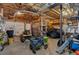 Spacious basement with a garage door, storage, and utility vehicles at 127 Hyde Way, Dallas, GA 30157