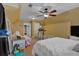 Bright bedroom with a queen bed, seating area, and lots of toys at 127 Hyde Way, Dallas, GA 30157