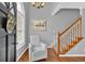 Bright and airy foyer with hardwood floors and a staircase at 127 Hyde Way, Dallas, GA 30157